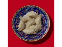 用英語介紹中國傳統(tǒng)美食：餃子的故事與發(fā)展歷程