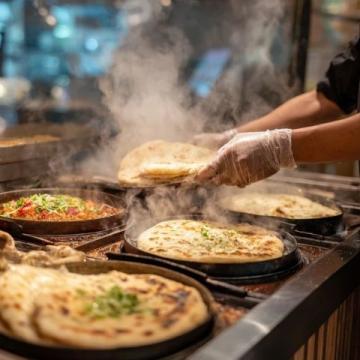 天津自制炸糕遇冷:鄰里不再串門品嘗的甜蜜煩惱